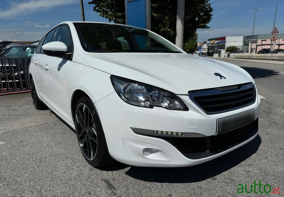 2015' Peugeot 308 Sw photo #1