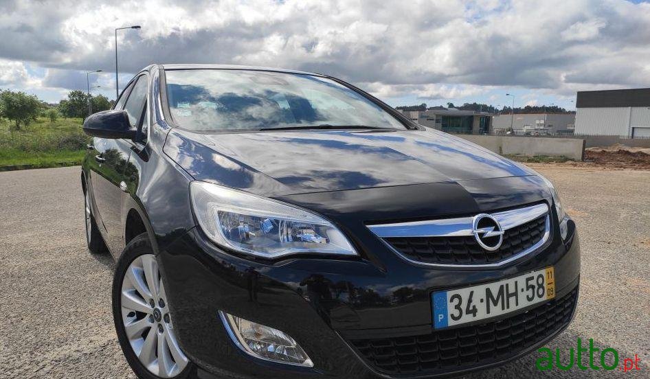 2011' Opel Astra Cosmo photo #1