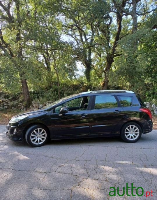 2008' Peugeot 308 Sw photo #1