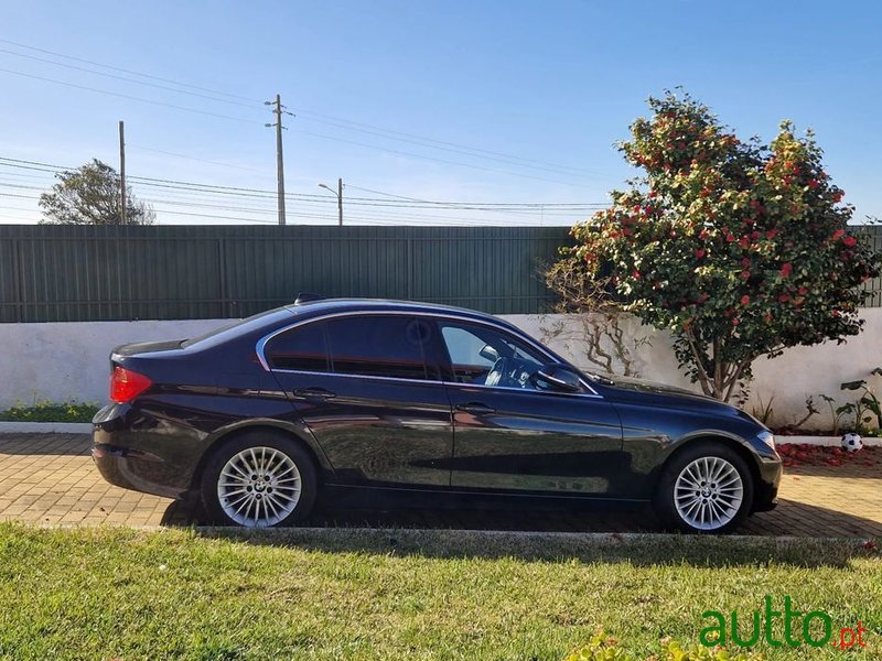 2015' BMW 318 photo #1