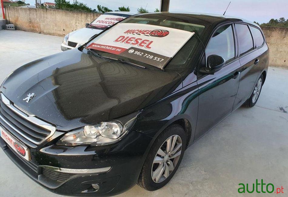 2014' Peugeot 308 Sw photo #1