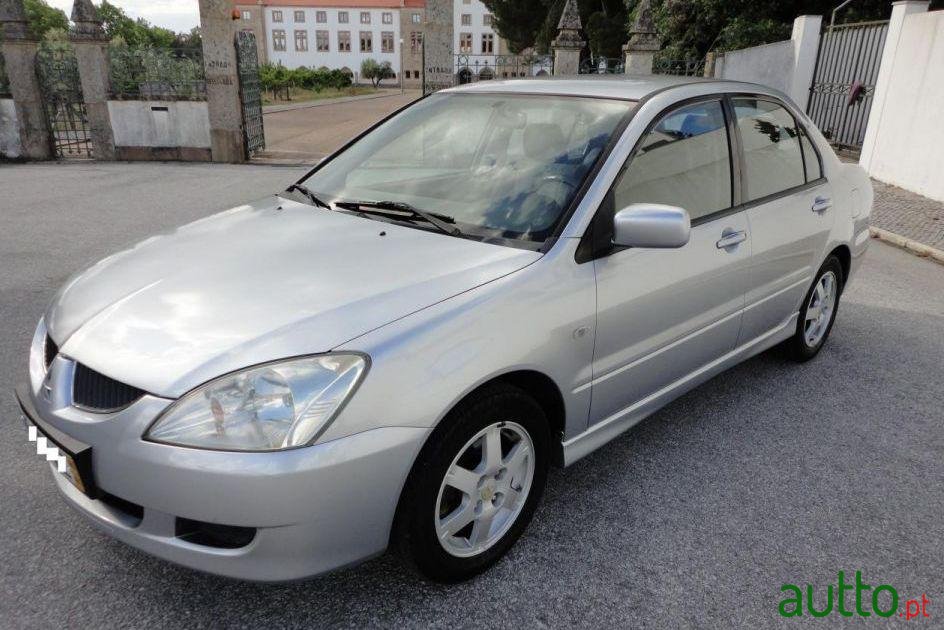 2004' Mitsubishi Lancer 1.3 Comfort P1 photo #1