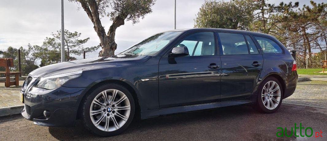 2009' BMW 520 photo #1