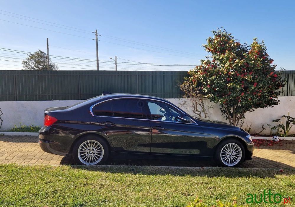 2015' BMW 318 photo #1