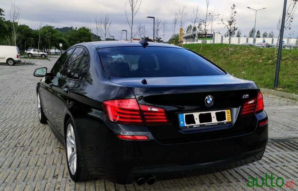 2014' BMW 520 photo #1