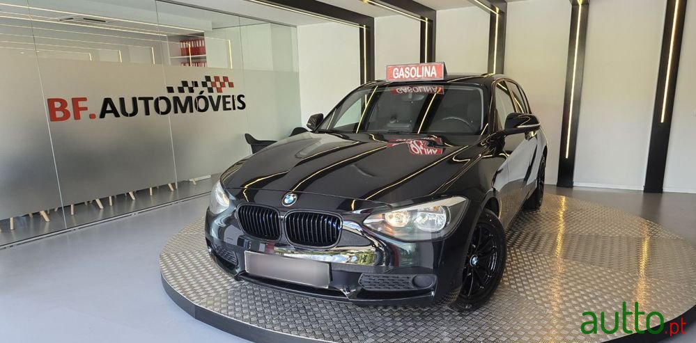 2011' BMW 116 I photo #1