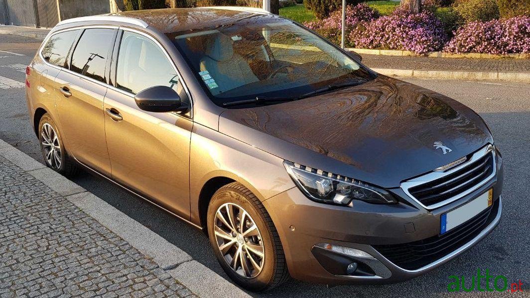 2014' Peugeot 308 Sw photo #1