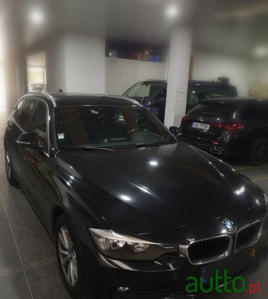2014' BMW 318 photo #1