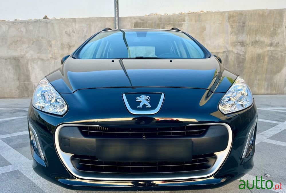 2013' Peugeot 308 Sw photo #2