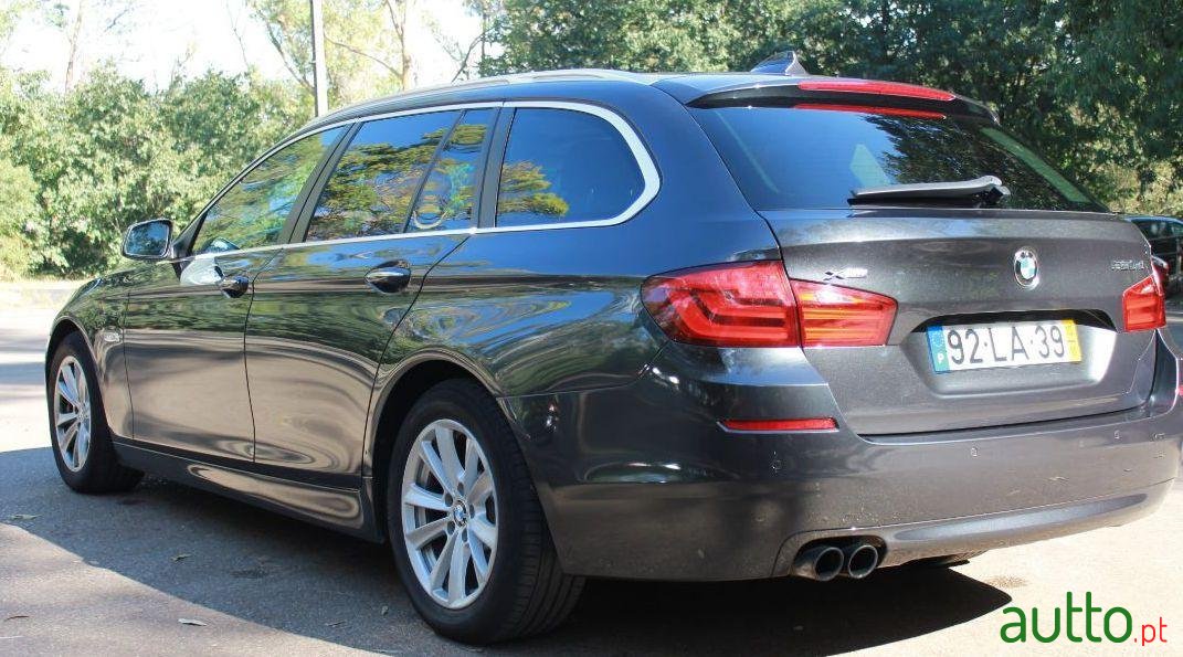 2010' BMW 520 photo #1