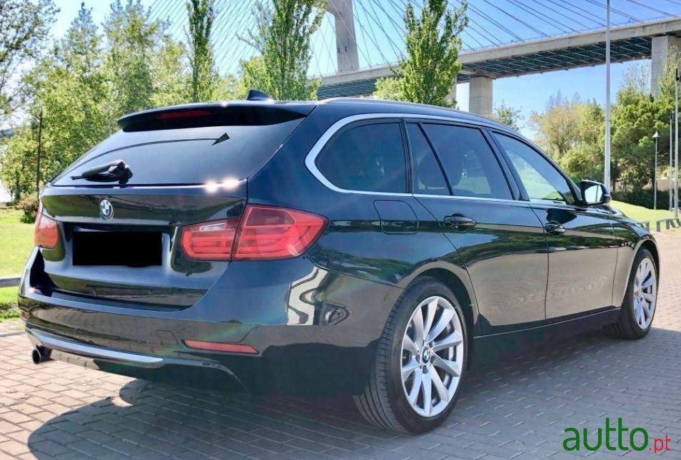 2014' BMW 320 D Touring photo #1