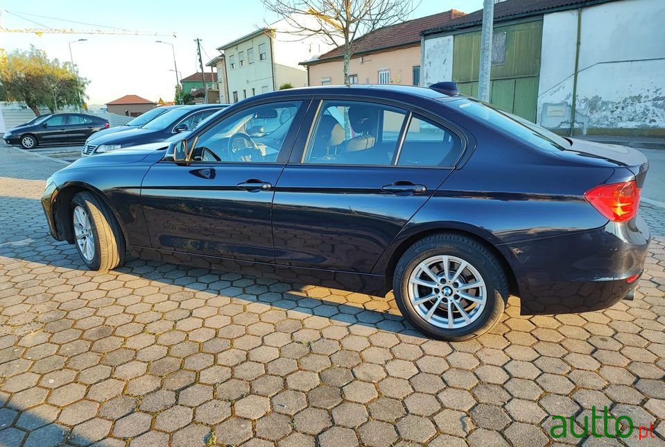 2014' BMW 318 photo #1