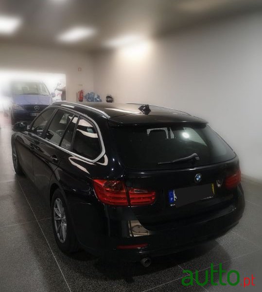 2014' BMW 318 photo #3