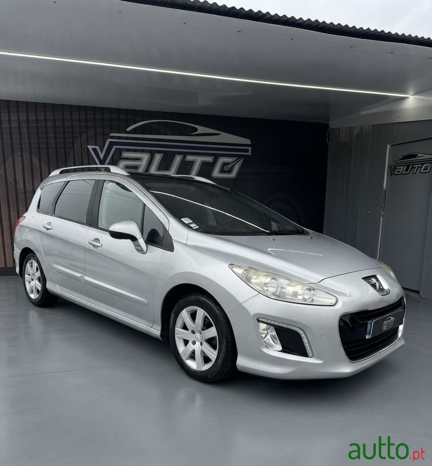 2013' Peugeot 308 Sw photo #2