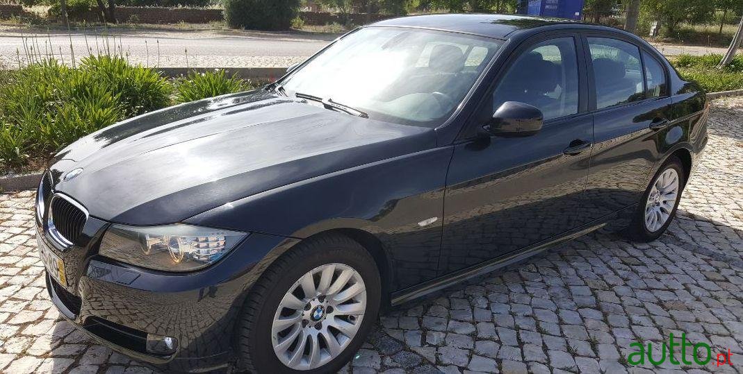 2009' BMW 318 photo #1