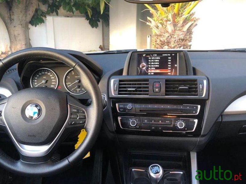 2016' BMW 116 Série 1 photo #1
