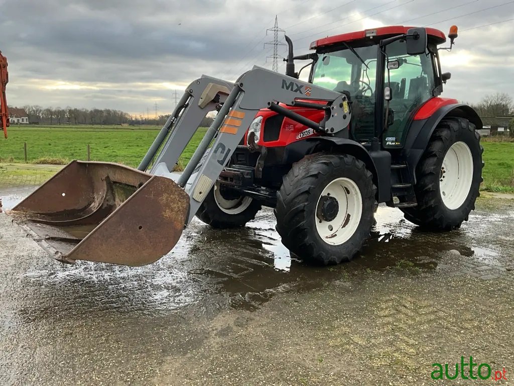 2007' New Holland TS135A - 4WD photo #1