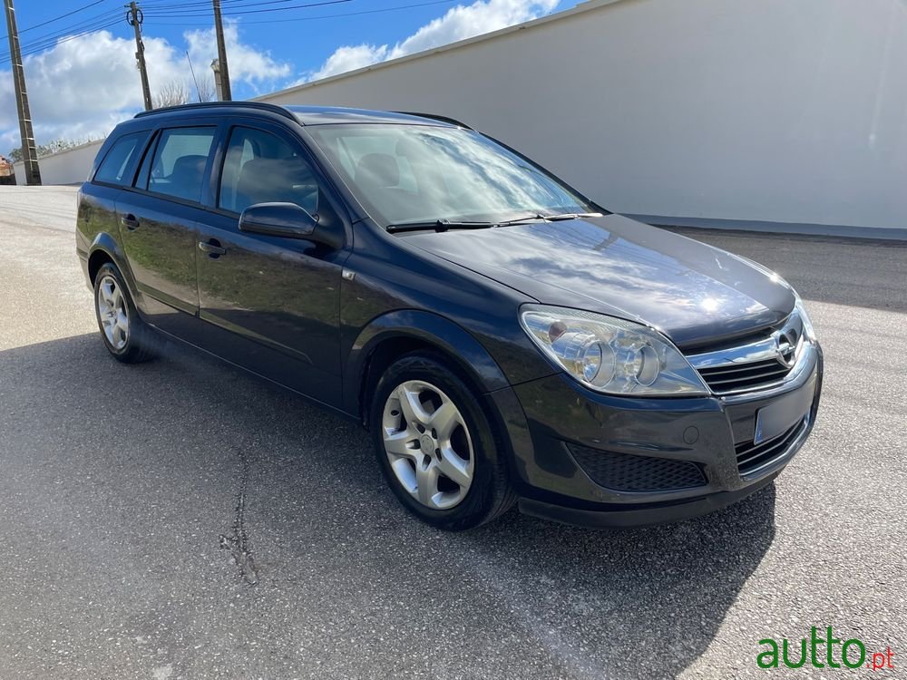 2008' Opel Astra Caravan photo #1