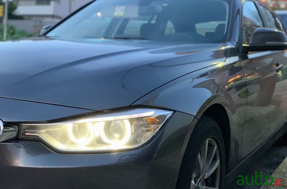 2014' BMW 318 photo #2