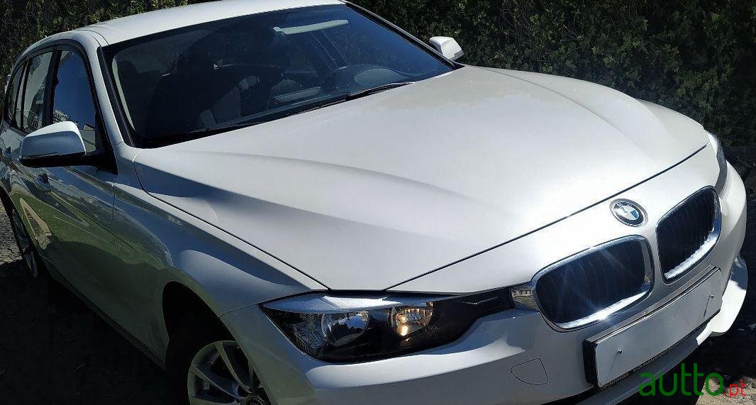 2013' BMW 318 Touring photo #2