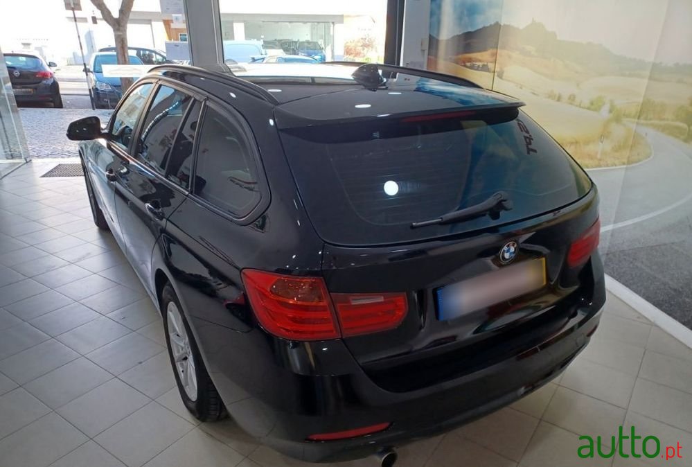 2013' BMW 318 D Touring Line Sport photo #5