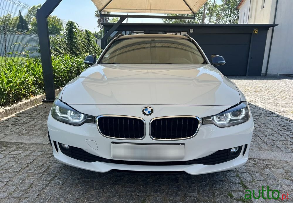 2014' BMW 318 D photo #2