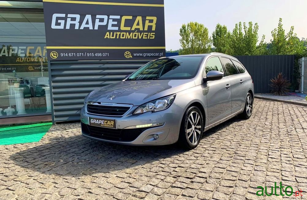 2014' Peugeot 308 Sw photo #1