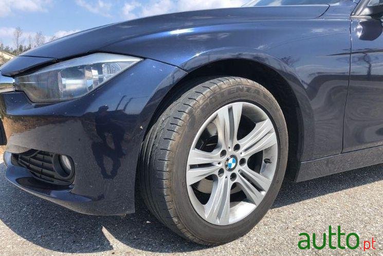 2013' BMW 318 D Touring Nacional photo #1