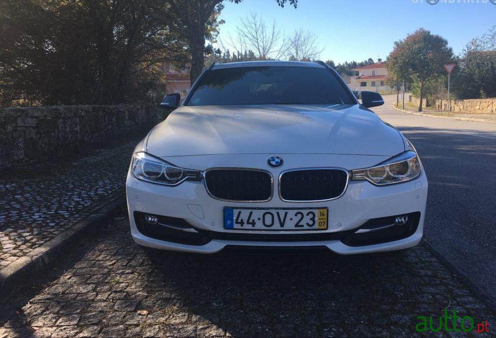 2014' BMW 318 D Touring Line Sport photo #2