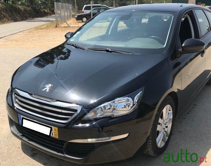 2014' Peugeot 308 Sw photo #1