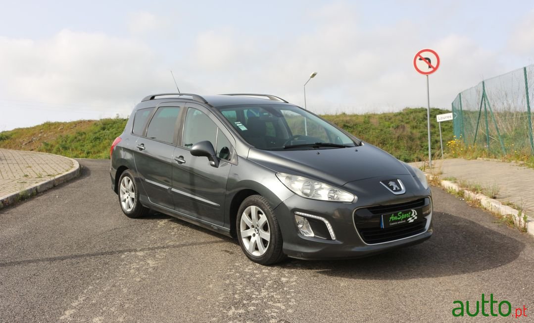 2012' Peugeot 308 Sw photo #1