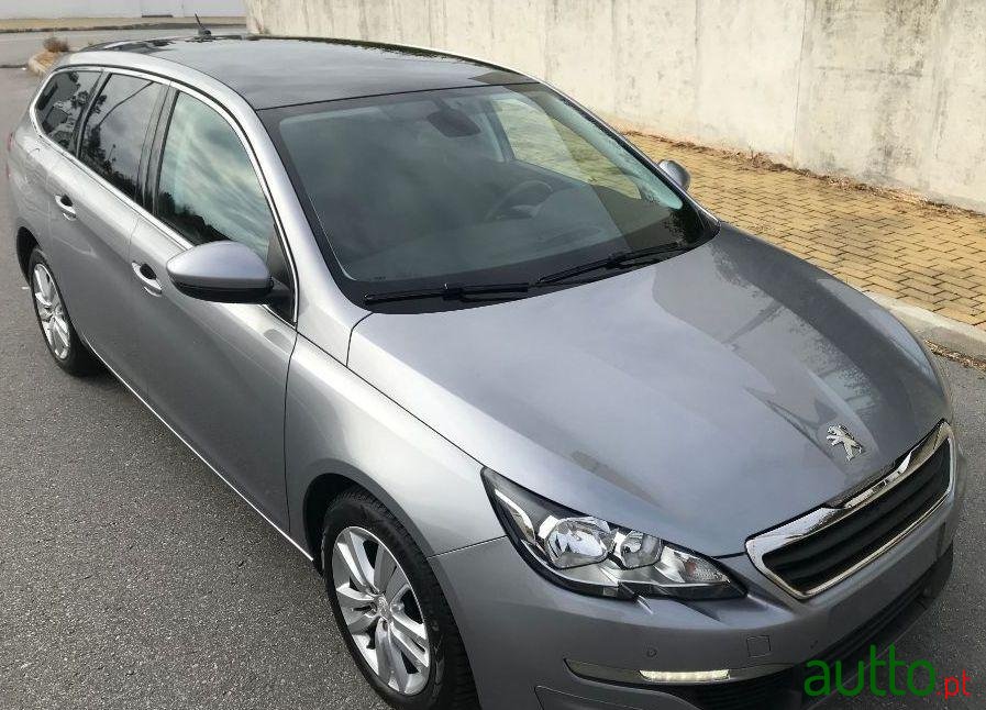 2014' Peugeot 308 Sw photo #1