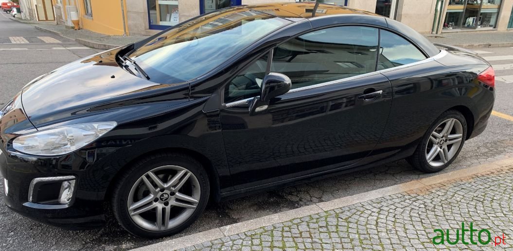 2011' Peugeot 308 Sport photo #1