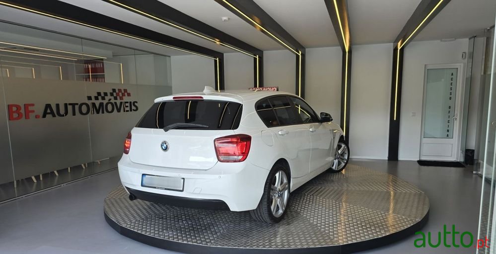 2011' BMW 116 I Line Sport photo #4