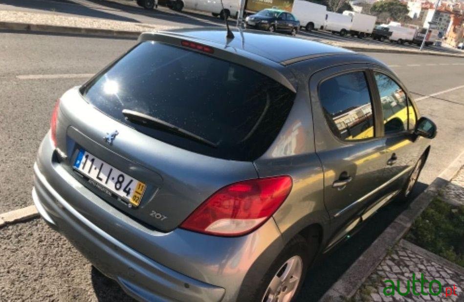 2011' Peugeot 207 Sportium 1.4 Hdi photo #1