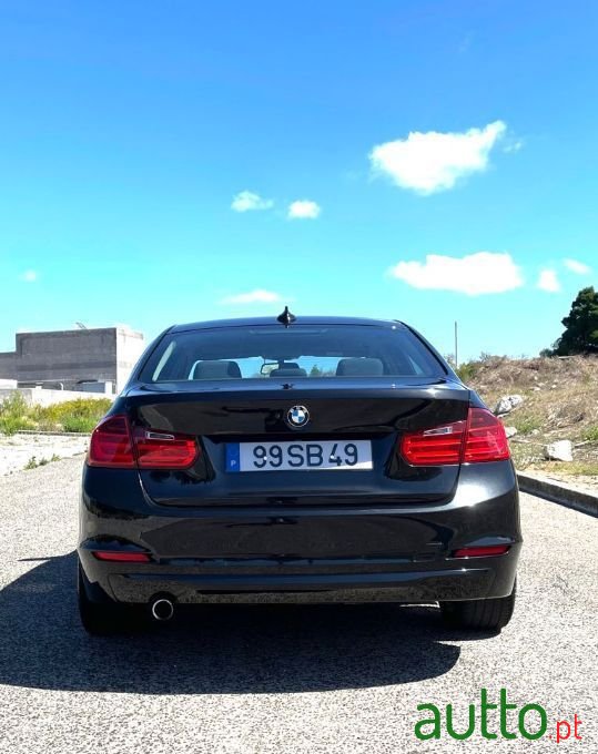 2012' BMW 316 photo #6