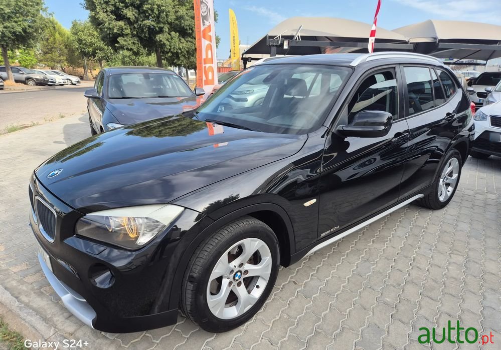 2010' BMW Série X 20 D Sdrive photo #2