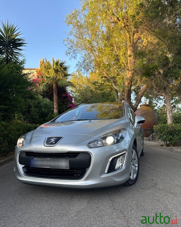 2013' Peugeot 308 Sw photo #3