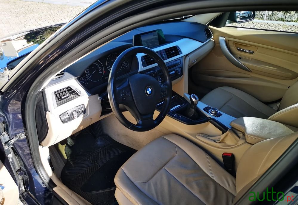 2013' BMW Série 3 D Touring photo #3