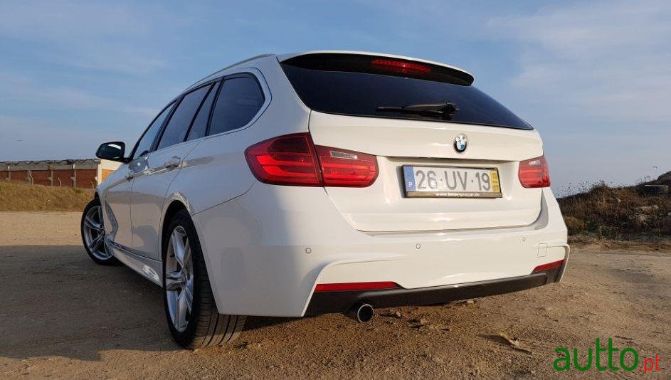 2013' BMW 318 photo #2