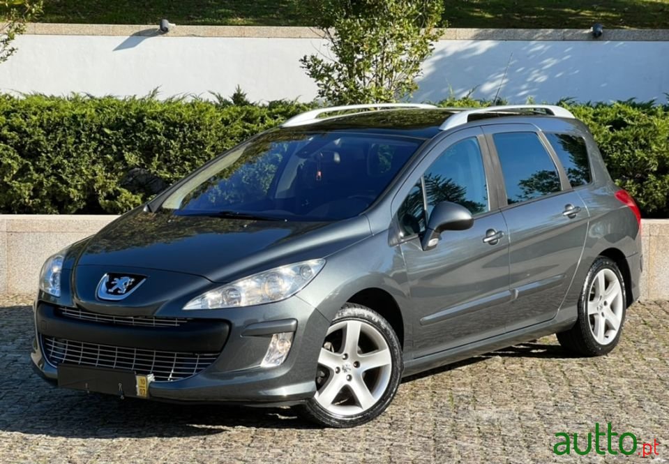 2010' Peugeot 308 Sw photo #1