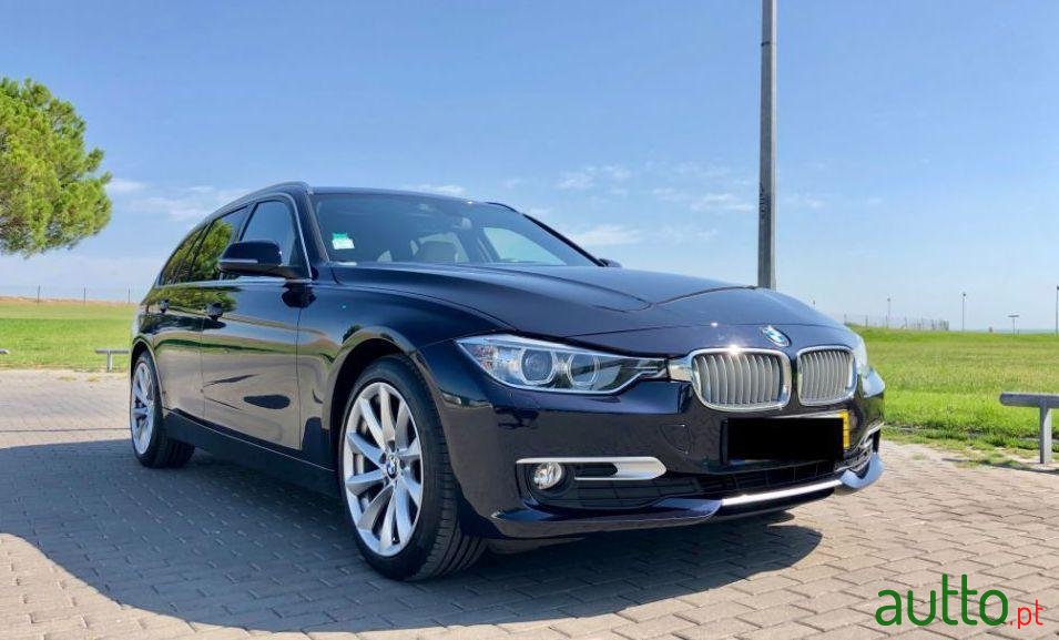 2014' BMW 320 D Touring photo #2