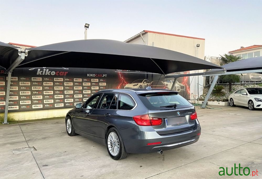 2014' BMW 318 photo #3