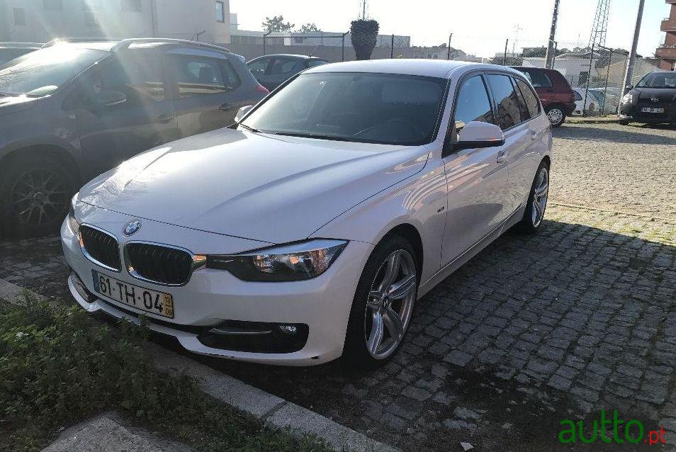 2013' BMW 318 photo #1