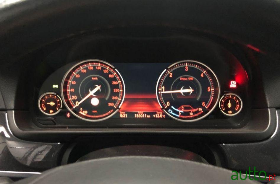 2013' BMW 518 Turing photo #2