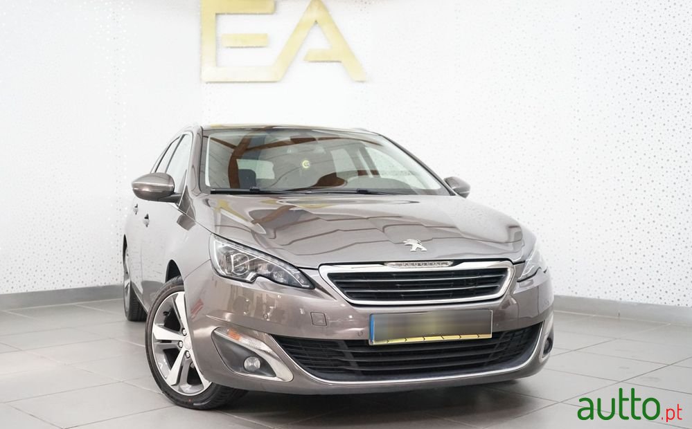 2014' Peugeot 308 Sw photo #1