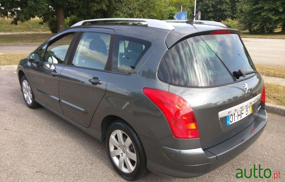 2009' Peugeot 308 Sw photo #1