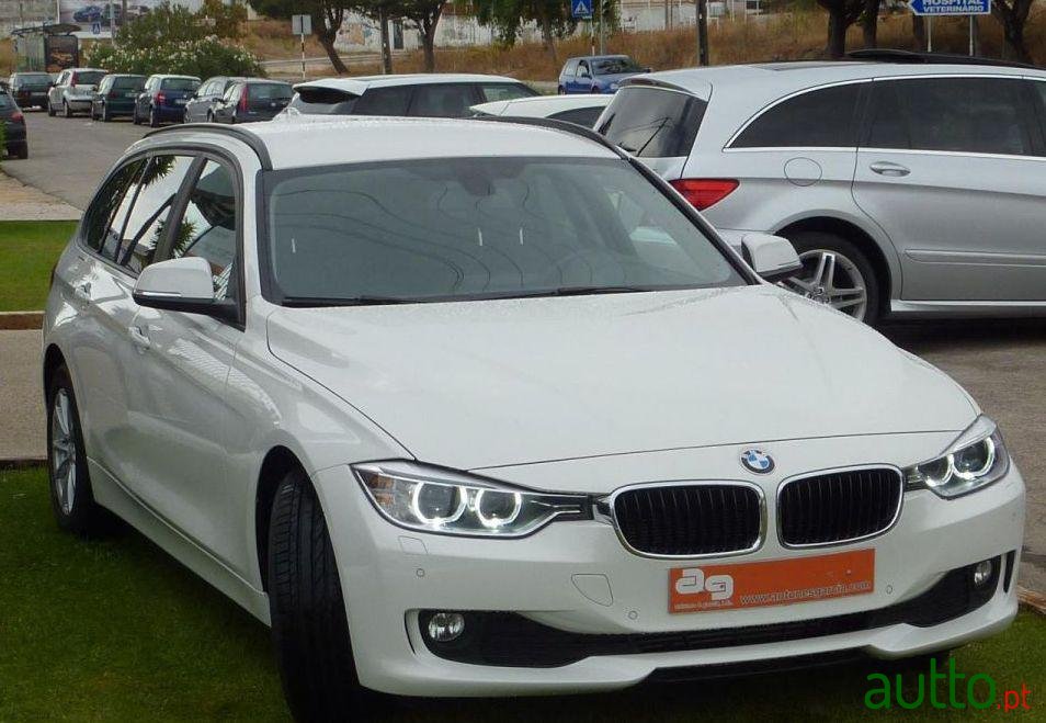 2013' BMW 318 D Touring Navigation photo #1