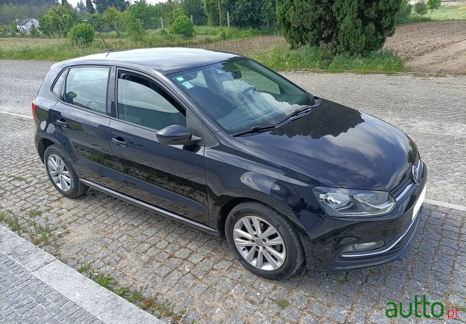 2014' Volkswagen Polo photo #1