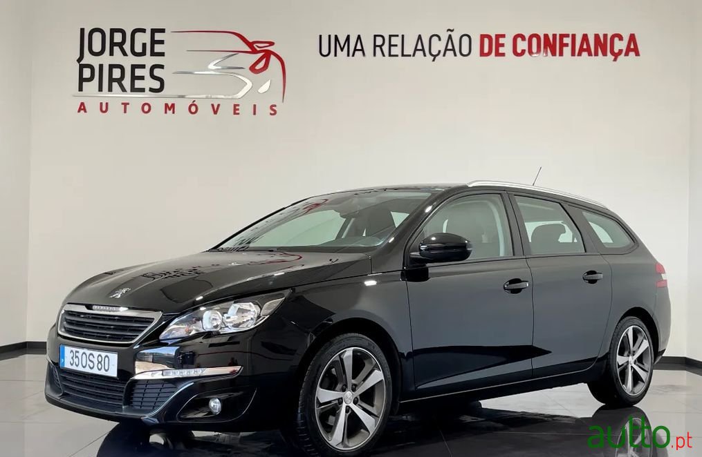 2014' Peugeot 308 Sw photo #1